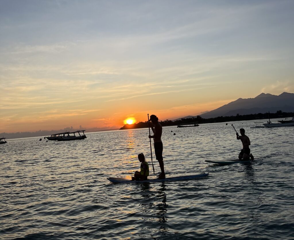 Sunrise paddleboarding with kids in Gili T