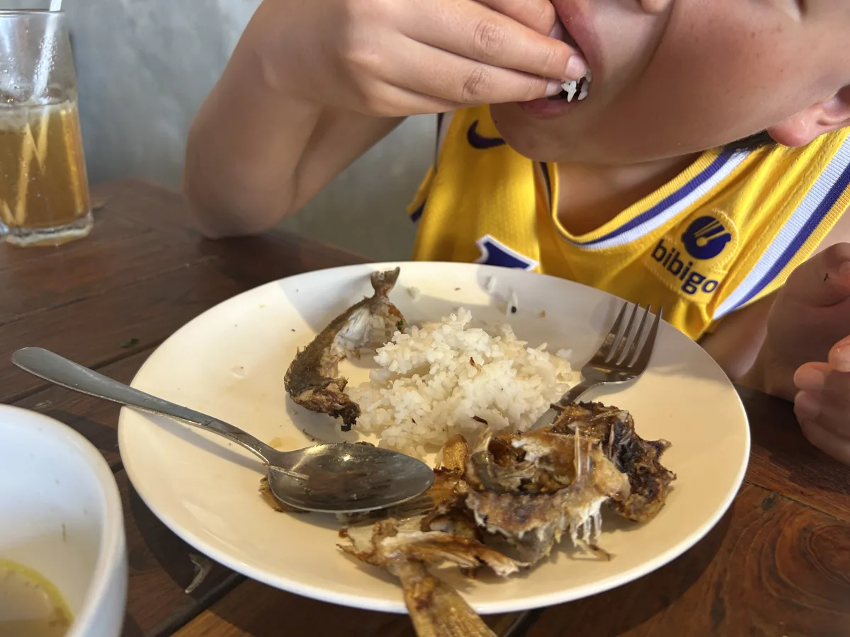 Our little boy even loved trying to eat his Nasi Campur with his hands, just like the locals!