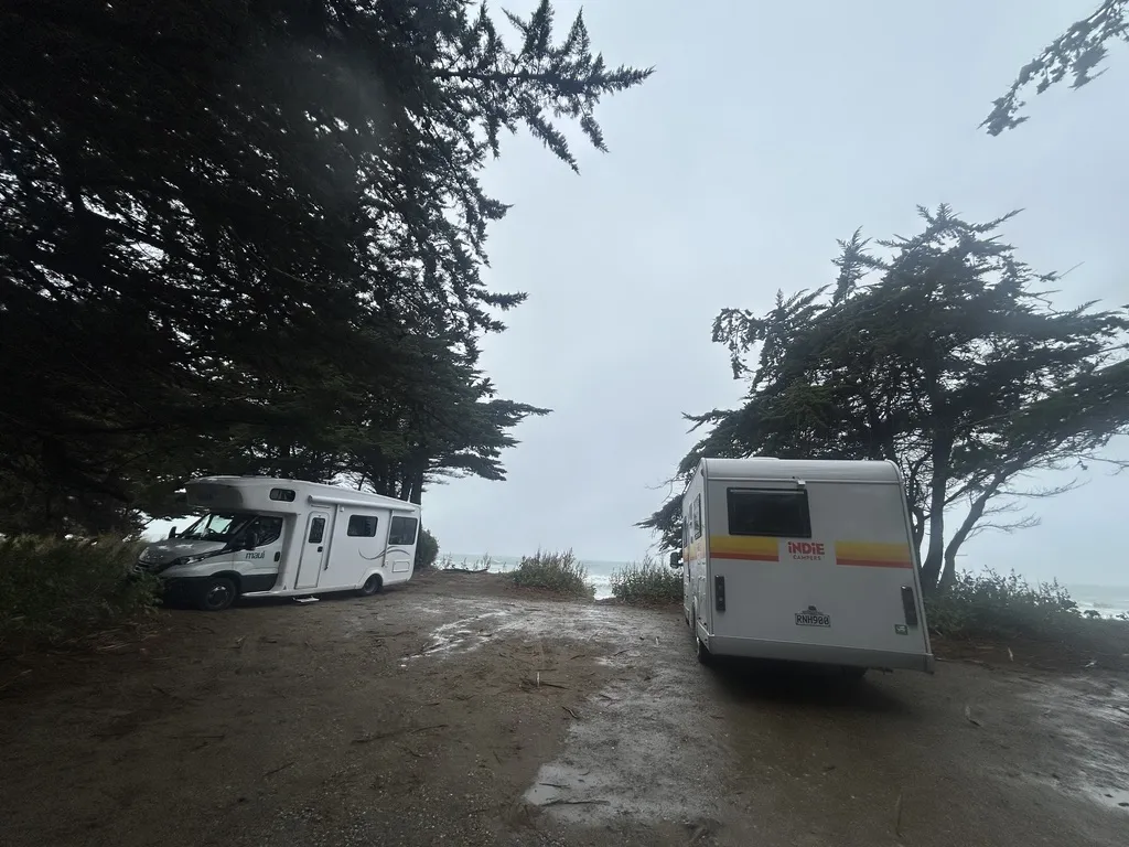 Maui Cascade campervan parked at Katiki Beach freedom camping site, Moeraki, South Island New Zealand