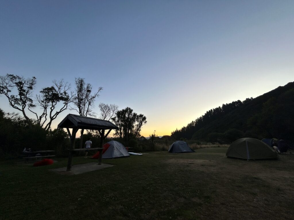 Relocation Car Rentals in New Zealand solo camping sunset