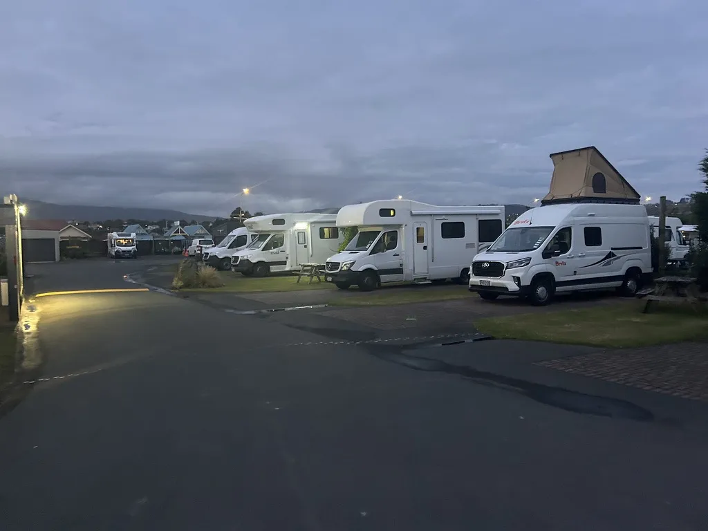 Dunedin Holiday Park is functional and central enough. Powered sites run ~NZ$91/night (~US$55).