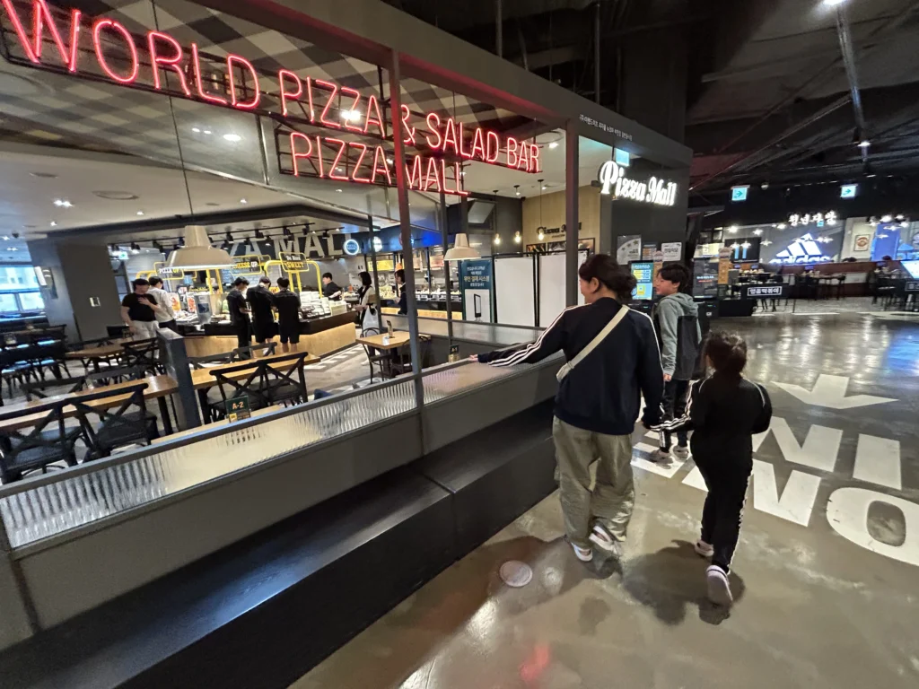 Pizza Club is the simpler version — all-you-can-eat pizza, pasta, and sides at a lower price point.